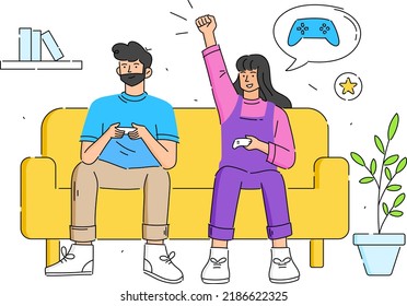 Young Couple Sitting on Sofa Playing Computer Games on Gaming Console
