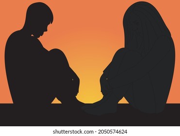 
Young couple sitting at sunset. Sunset with a young couple