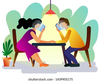 Young couple sitting  together in a restaurant  and resting, holding hands, but looking into smartphones