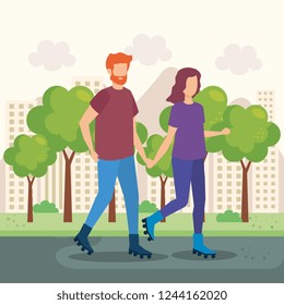 young couple with skates in the park