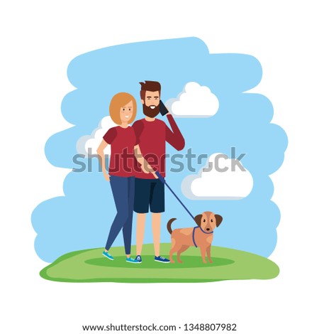 young couple with smartphone and dog