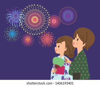 Young Couple Smiles Watching Fireworks