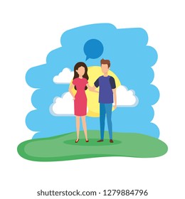 young couple with speech bubble in the field