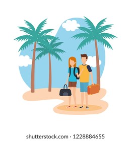 young couple with suitcase on the beach