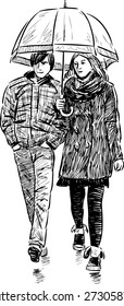 young couple under umbrella