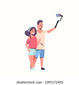 young couple using selfie stick lovers taking photo on smartphone camera man woman having fun male female cartoon characters full length white background