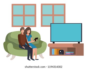 young couple using smartphone in living room