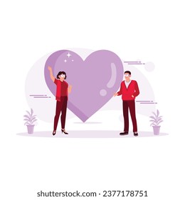 A young couple using virtual glasses stands before a big heart sign. Virtual Relationships concept. Trend Modern vector flat illustration