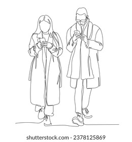 Young couple walking and using mobile phones on the go. Wearing warm coats and scarf, glasses. Internet addiction concept. Single line drawing. Black and white vector illustration in line art style.