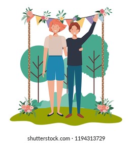 young couple waving in nature