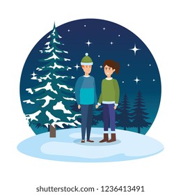 young couple with winter clothes in snowscape