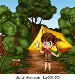 Young Cute Boy Scout Cartoon Character with a Wood Stick and Magnifying Glass in the Forest. Little Scout Standing on a Forest Path Near his Tent