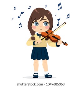 Young cute little girl playing violin happy enjoying music