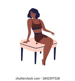 Young dark skin african american woman in sport underwear sitting on chair. Stylish slim girl model in brown beachwear posing. Flat vector cartoon illustration isolated on white background