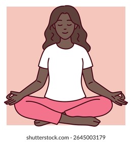 Young dark skinned woman sits in lotus pose with eyes closed, practicing meditation and mindfulness in calm and peaceful setting