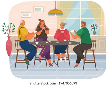 Young and elderly people with board game spend time in living room. Family plays cards at home