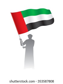 Young Emirati Holding UAE Waving Flag, Vector Illustration