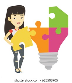 Young excited asian student takes apart idea light bulb made of puzzle. Student standing near the idea bulb. Student having a great idea. Vector flat design illustration isolated on white background.