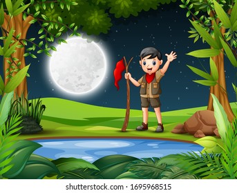 Young explorer in the forest at night