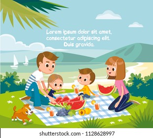 Young family with children and puppy having summer picnic sitting on the grass on blanket by the beach eating large red watermelon and fruits.