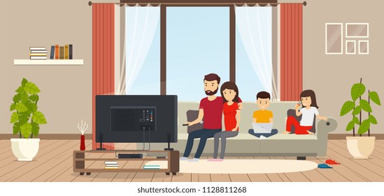 Young family at home sitting on couch, watching TV, child working on laptop, daughter eating ice cream. Modern interior room with panoramic windows.