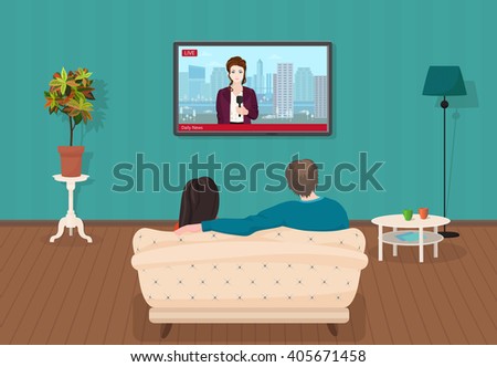 Young family man and women watching TV daily news program together in the living room. 