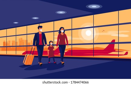 Young family traveler wearing face masks with baggage walking at airport gate terminal lounge traveling on holiday during pandemic outbreak. Airplanes behind glass window. New normal holiday vacation.