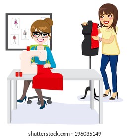 Young fashion designer dressmaker sewing red outfit and assistant working on mannequin