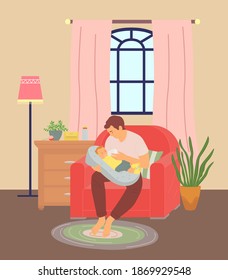 Young father feeding his baby son with milk from bottle. Dad sitting in armchair in room and holding kid in hand. Care of young parent. First steps of fatherhood. Single father, parenting concept