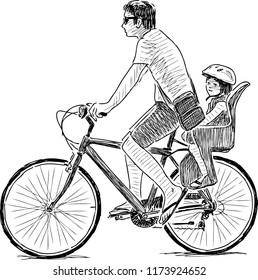 A young father with his kid rides on a bicycle