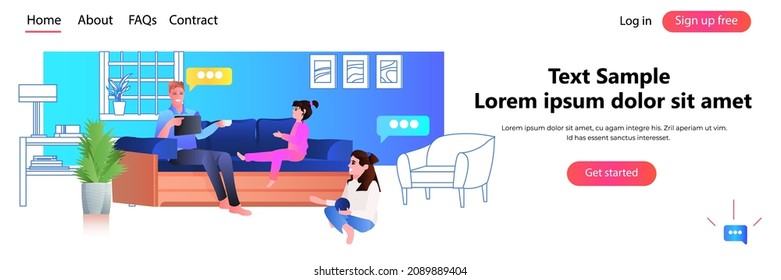 young father spending time with little children at home fatherhood parenting concept living room interior horizontal