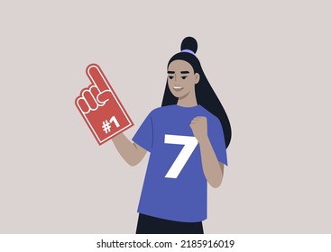 A young female Asian team supporter waving a foam finger, sports competition