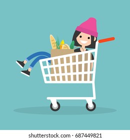 Young female character fooling around in the supermarket. Riding in the cart / flat editable vector illustration, clip art