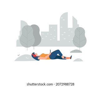 Young female character laying down on grass and listening to music in a city park.Vector illustration cartoon flat style