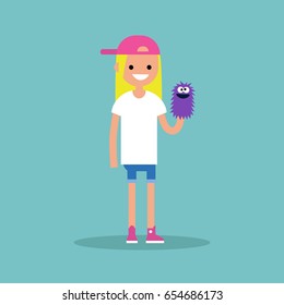 Young female character playing with a hand puppet / flat editable vector illustration, clip art