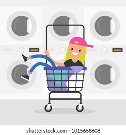 Young female character riding in a laundry cart. Daily routine. Having fun. Flat editable vector illustration, clip art