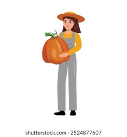 Young female farmer wearing a big hat, proudly holding a large pumpkin from the harvest