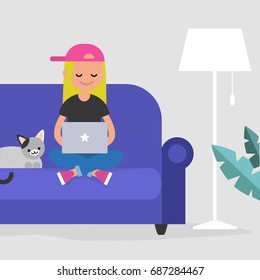 Young female freelancer working at home / flat editable vector illustration, clip art