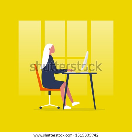 Young female manager sitting at the computer. Office worker. Interior. Desk and chair. Side view. Millennial lifestyle, daily routine.