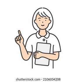 A young female nurse explaining by pointing.