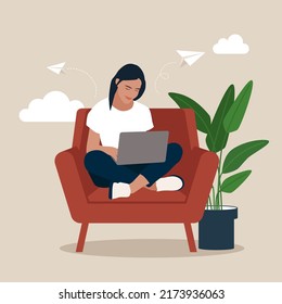 Young female sitting on the armchair and working with laptop. 
Freelance, online education or social media concept. Flat style. Vector flat illustration.