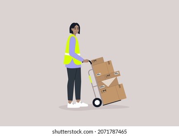 A young female storage worker wearing a high visibility yellow vest