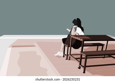 A young female student is sitting on a bench waiting for someone to take her home