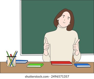 Young female teacher sitting at desk with school tools in classroom with blackboard behind her, smiling showing thumbs up. Vector flat illustration.