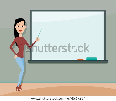 Young female teacher standing in front of blackboard. Teacher teaching student in classroom at school, college or university.
