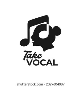 a young female vocalist is doing a take vocal or singing a song