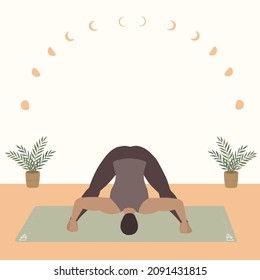 Young fit man doing yoga, standing in Prasarita Padottanasana or Wide legged forwars bend pose indoors with beautiful boho style background