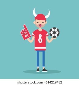 Young football fan wearing horned hat and foam finger / flat editable vector illustration, clip art