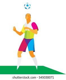 A young footballer skillfully juggles the ball head