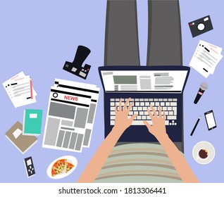 young freelance journalists sit back and forth working on a laptop